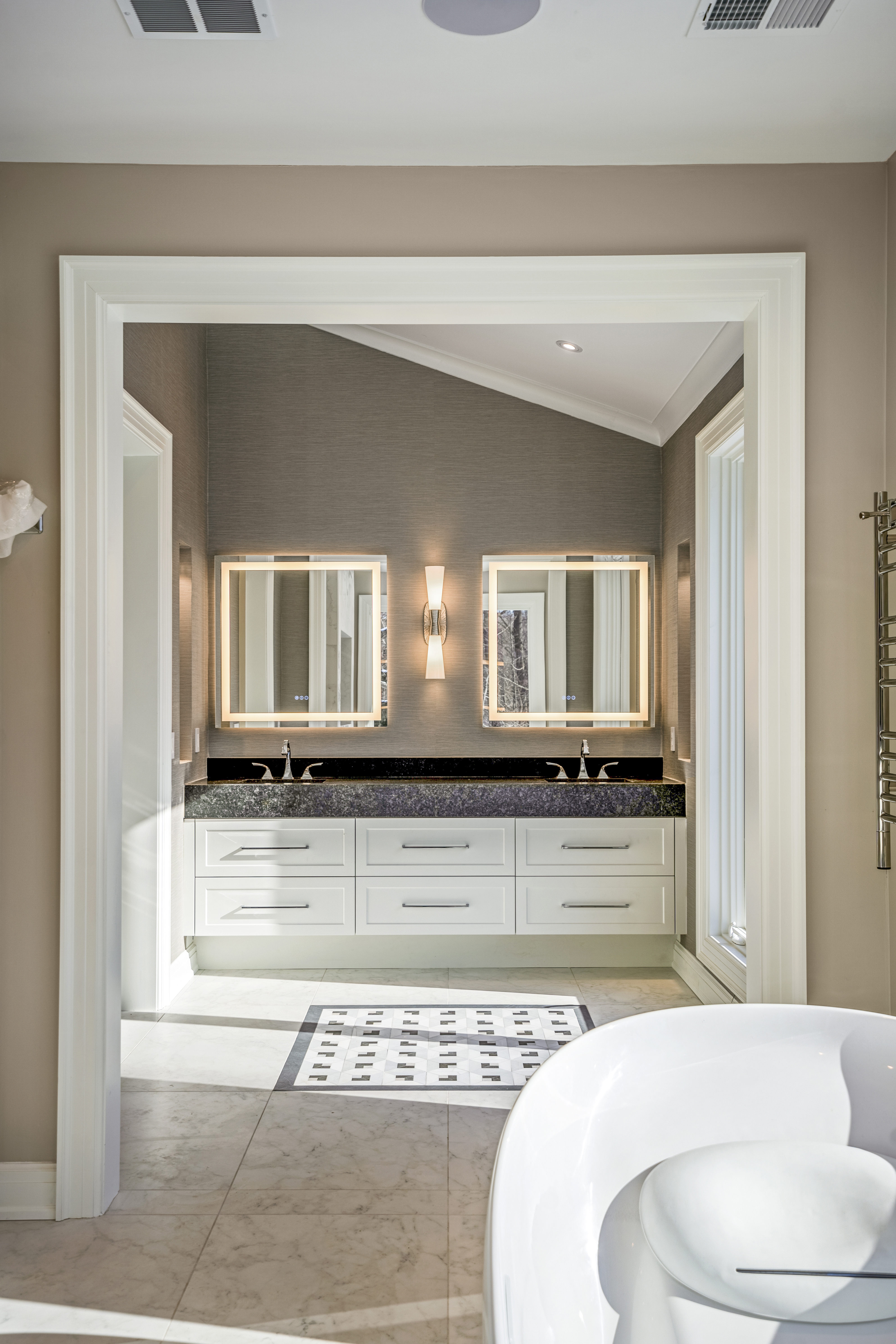 Double vanity bathroom renovation with dark granite